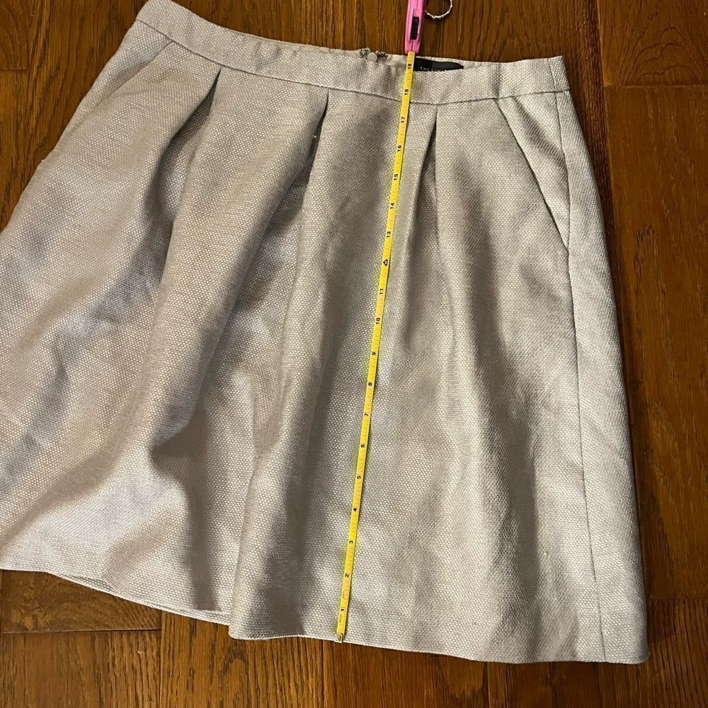 The Limited khaki colored zip up skirt size small